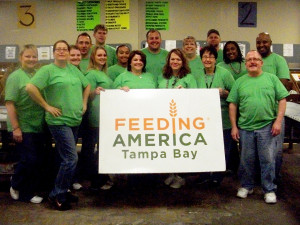 Tampa Electric team members pause for a photo at Feeding America Tampa Bay.