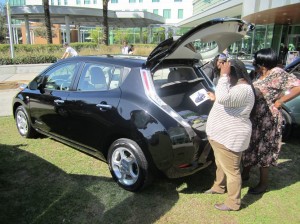 USF Sustainability Showcase visitors check out one of Tampa Electric's all-electric Nissan LEAFs.