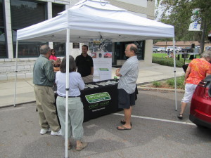 Tampa Electric’s Kenneth Hernandez explaining the benefits of owning an EV.