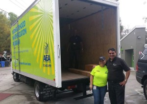 Heather Santana, program manager for Tampa Electric's Neighborhood Weatherization program with Jose Garcia with Rebuilding Together Tampa Bay.
