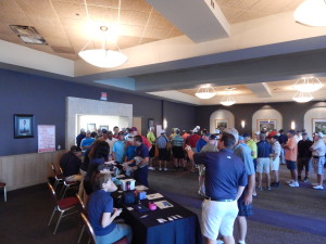Tournament participants fill the room.