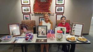 Debbie Duvall Griffin and Ricky Boyette raise funds and win smiles for Paws for Patriots.