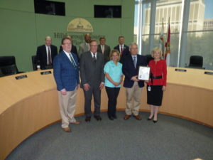 Hillsborough County Commissioner Sandra Murman, right, honors the Manatee Viewing Center. Representing TECO, from left, are Alan Denham, Stan Kroh, Jamie Woodlee and Paul Carpinone.
