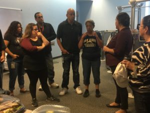 As Hurricane Irma neared the Tampa Bay area, NMGC call center representatives huddled to map out their plan to help field calls from TECO customers.